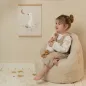 Preview: Kleinkind sitzt auf weichem Little Dutch Sessel in Beige