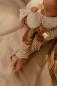 Preview: Kuschelgans 25 cm neben passendem Babyspielzeug von Little Dutch
