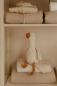 Preview: Little Dutch Kuscheltier Gans auf einer Babydecke platziert