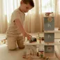 Preview: Kind spielt mit Holzparkhaus Blau und Fahrzeugen aus FSC-Holz